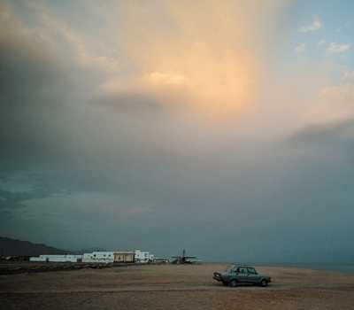 sea blue - car on shore - scenery