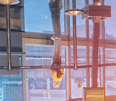 valence - woman reflection in airport