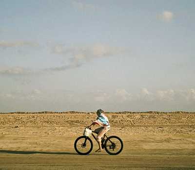 yellow - biking in desert